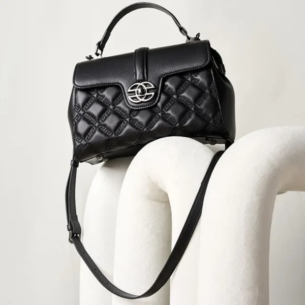 Small black satchel purse, compact leather handbag for casual or office wear