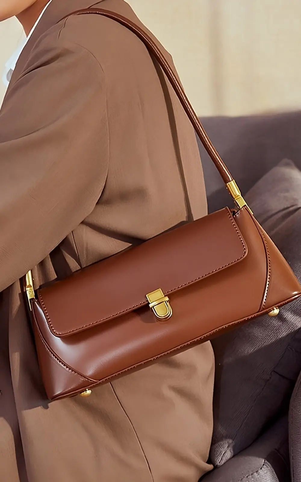 Premium brown cowhide shoulder bag with flap closure