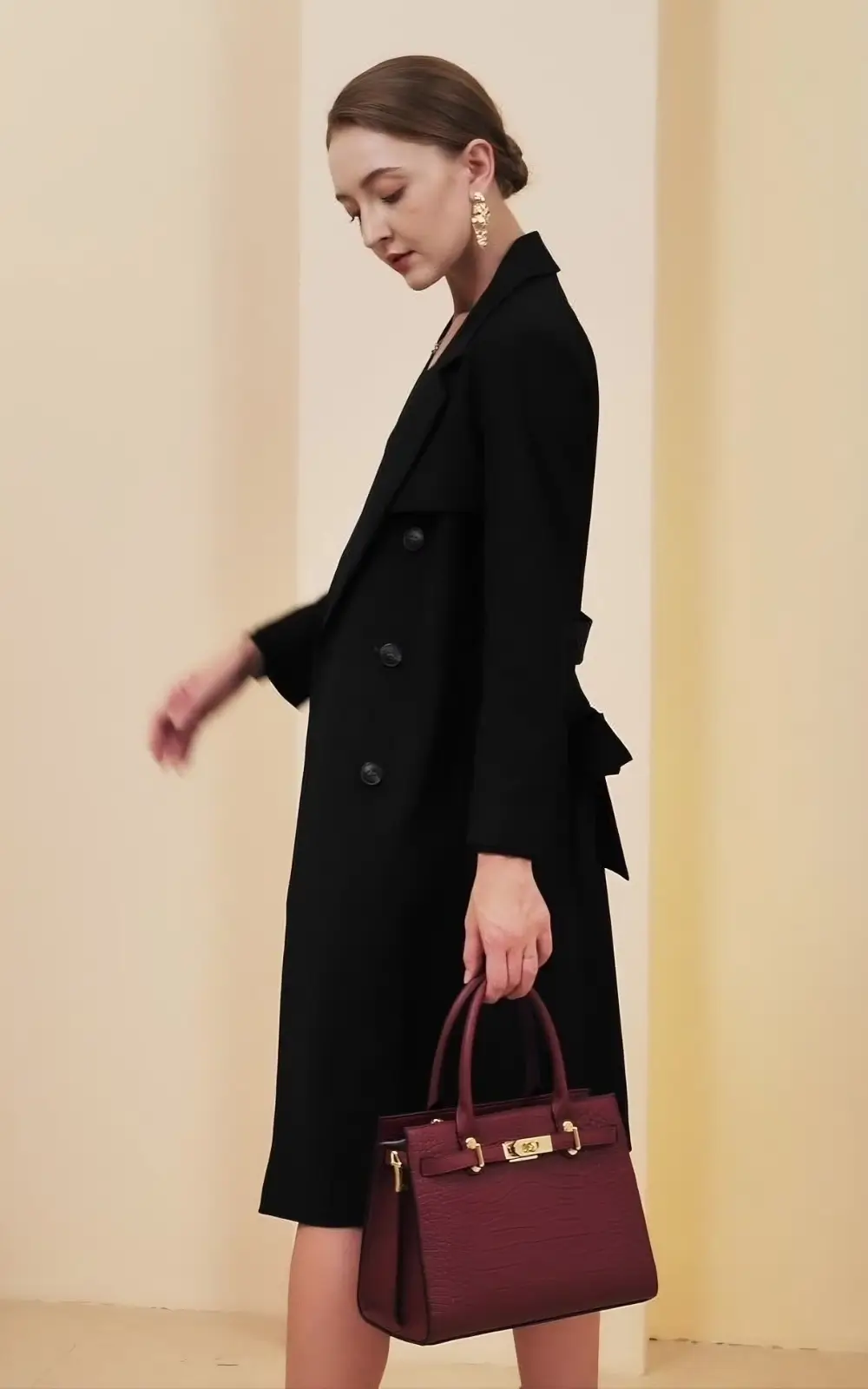 Red designer structured handbag with versatile carry