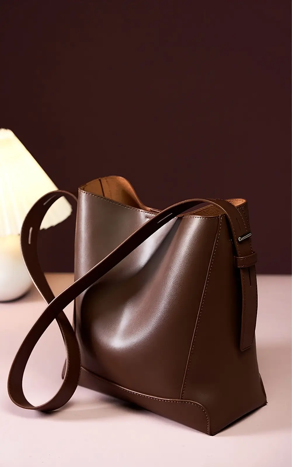 Front view of black Lunaro Bucket with detachable shoulder strap