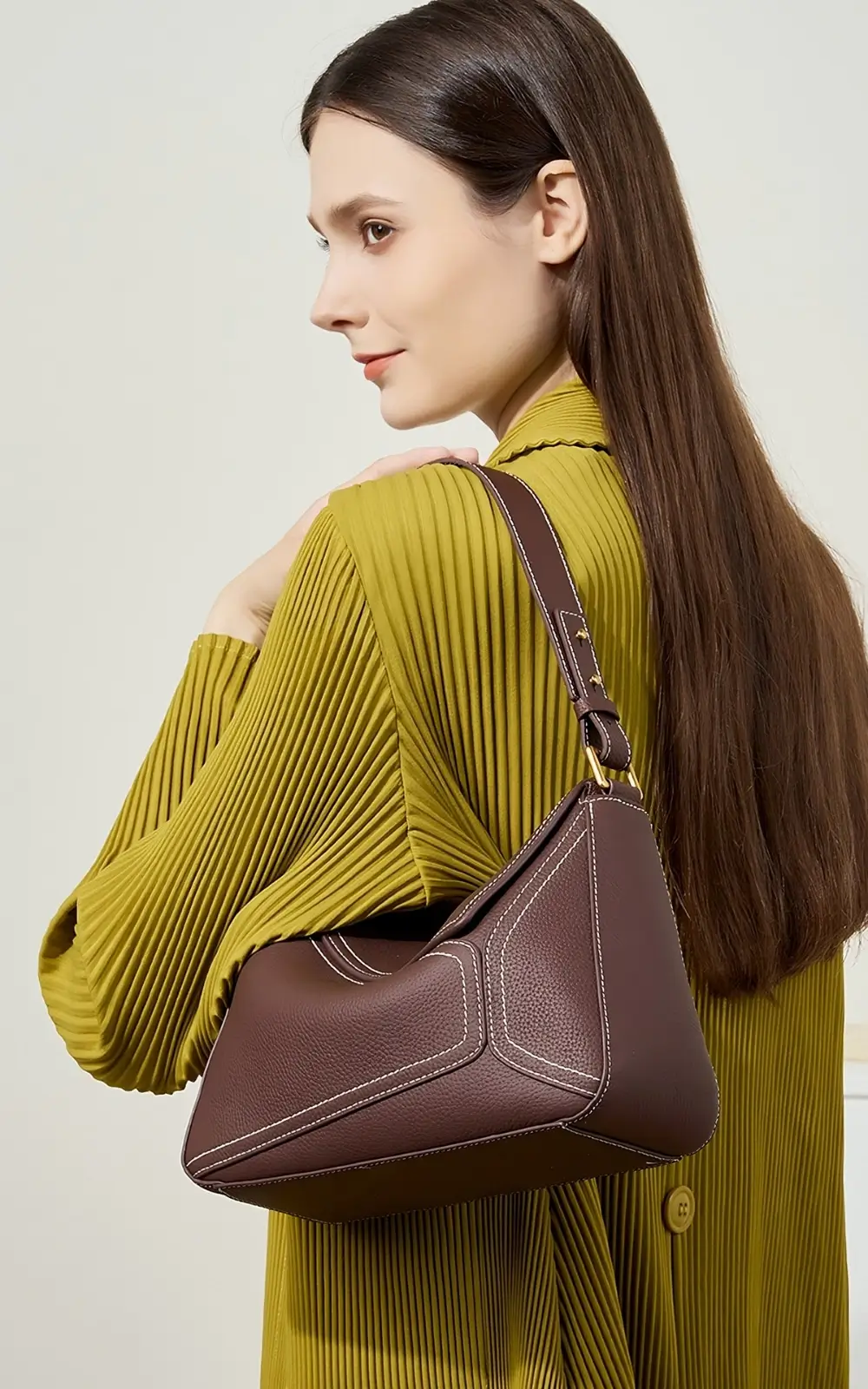 Detail close-up of pebbled calfskin texture on Hoclin Serena Bag