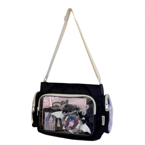 Classic black ita messenger bag with a transparent PVC window showing anime badges and gothic accessories Learn how to describe the purpose of the image(opens in a new tab). Leave empty if the image is purely decorative.Title Classic Black Ita Bag - Durable Pin Collector Messenger
