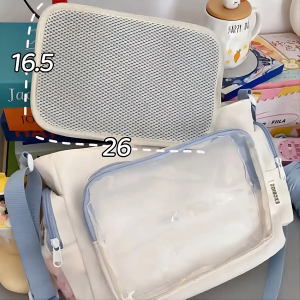 Cream ita bag with removable mesh insert and display window dimensions labeled 26cm x 16.5cm