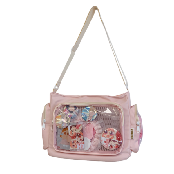 Pink kawaii large ita bag with anime pins and manga merch displayed in clear window