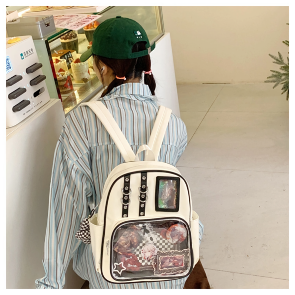 Back view of clear window ita backpack showing padded straps and anti-theft zipper