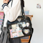 Black Ita Bag Modeled Over Shoulder