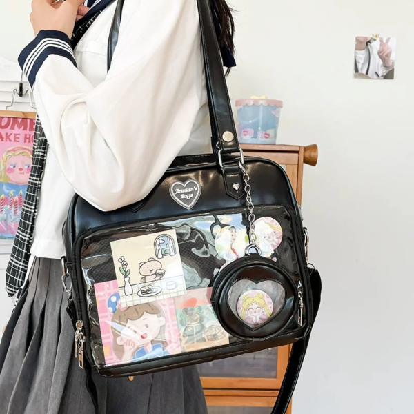 Black Ita Bag Modeled Over Shoulder