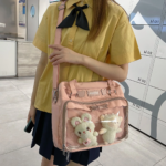 Close Up of Scalloped Edge Ita Bag Zipper and Rabbit Plush | Hoclin