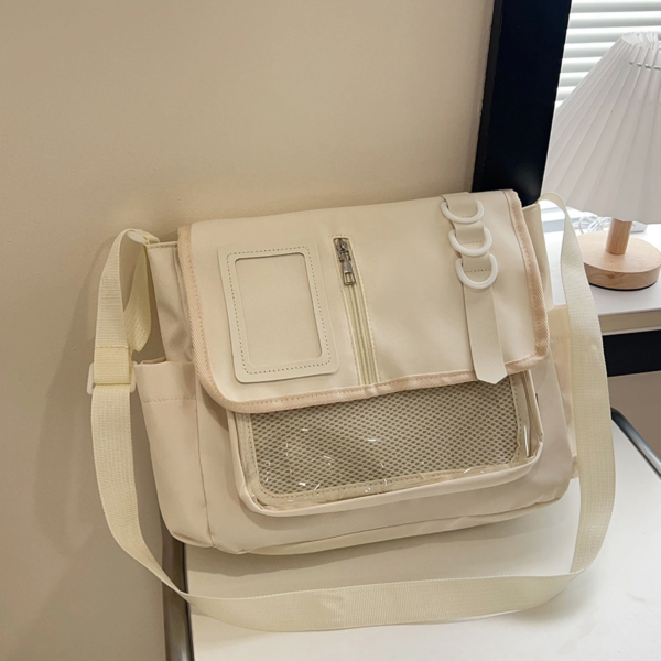 Cream white ita bag open showing interior zipper pocket and space for A4 magazine