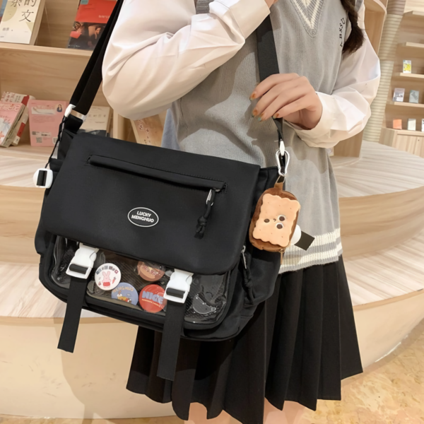 Back view of ita bag showing padded shoulder strap and zipper