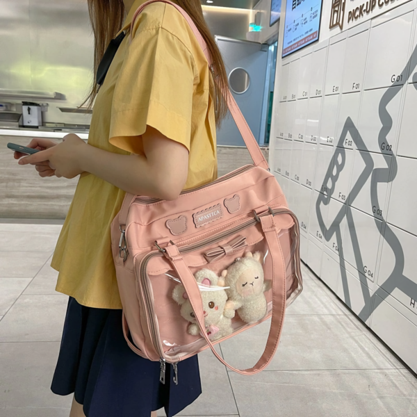 Lifestyle Shot: Pink Ita Bag Worn Crossbody | Hoclin