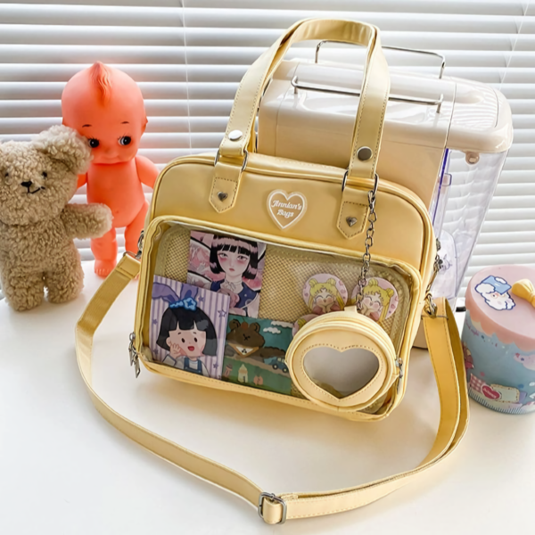 Pastel Yellow Ita Bag on Desk with Accessories