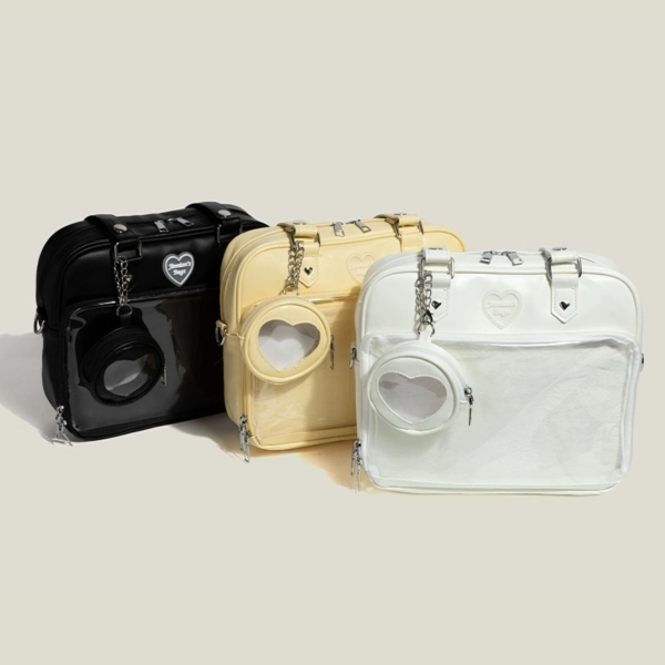 three empty ita bags in black yellow and white side by side showing clean design