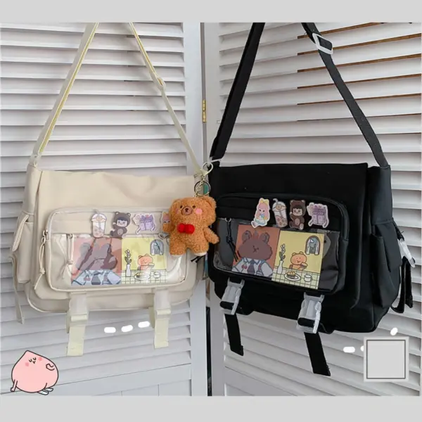 Two ita bags side by side: cream and black, showing clear window pockets and dangling straps