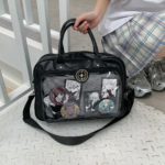 Closeup of White Ita Bag Handle and Zipper | Hoclin