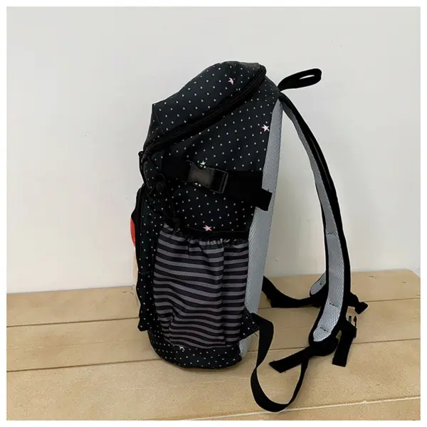 Black Ita Backpack Side Profile Black Ita Backpack Side Profile