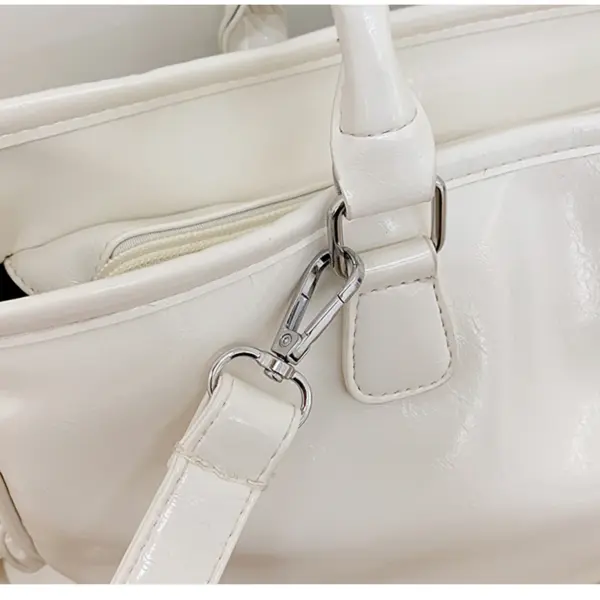 Close up of Strap Hardware and Handle Attachment