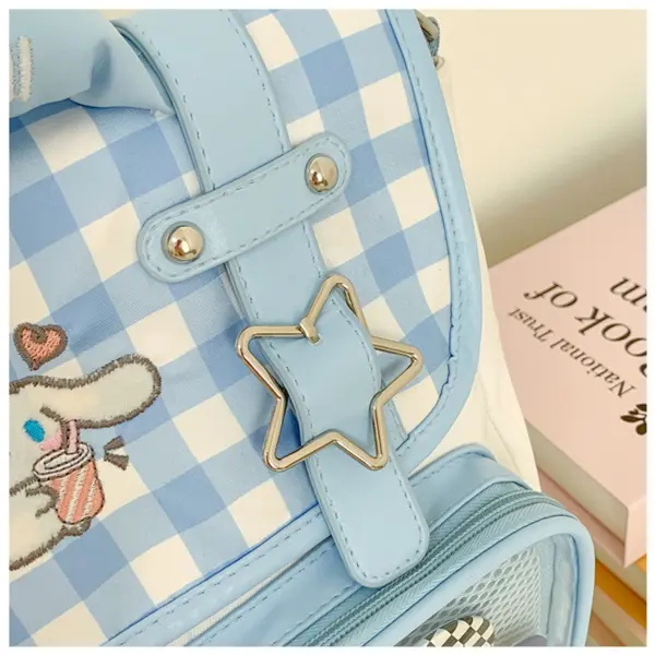close up of star ornament and plaid fabric