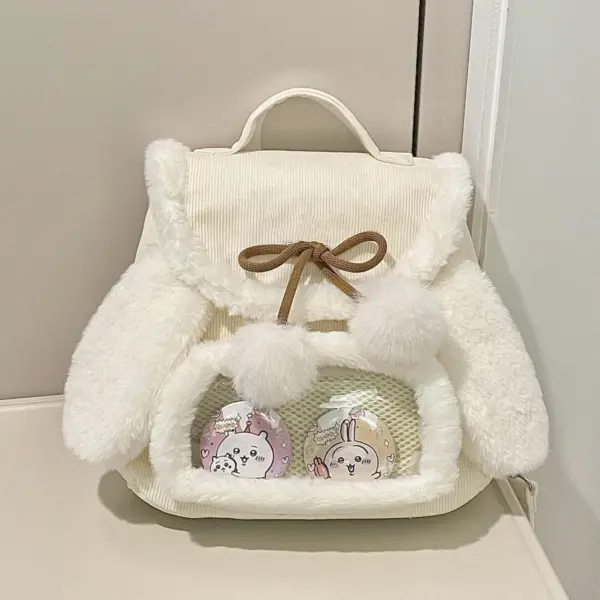 clear front pocket displaying plush toys and pins