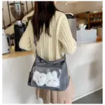 Dark Gray Ita Bag Worn from Behind Dark Gray Ita Bag Worn from Behind