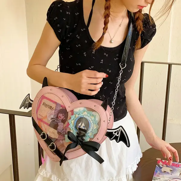 pink heart ita bag with brand tag