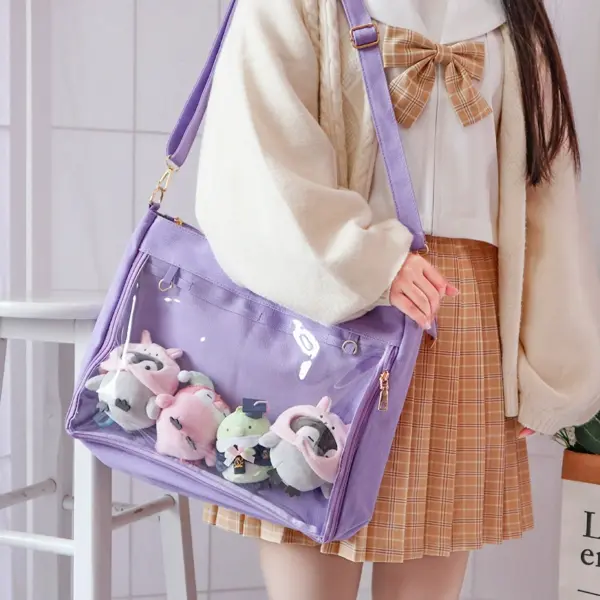 fan displaying pin collection in clear window tote