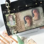 Black Ita Bag with Green Tassel