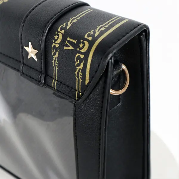 Close up of gold VI detail and strap hardware