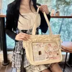 Cream Ita Bag on Cafe Table with Pins Cream Ita Bag on Cafe Table with Pins