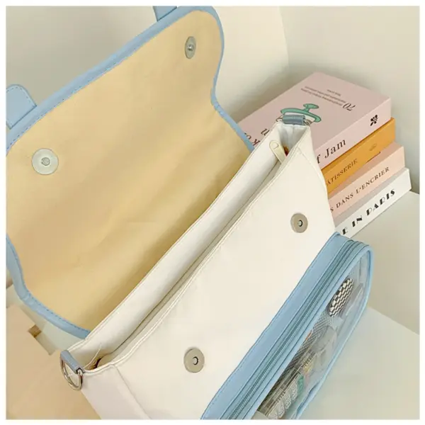 canvas ita bag with adjustable straps and metal hardware
