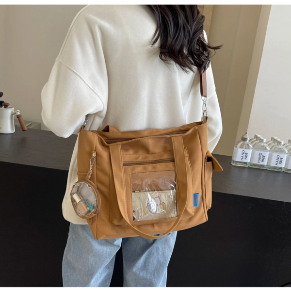 Open ita bag showing interior and clear window