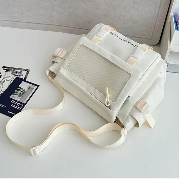 Spacious Interior of Clear Window Ita Bag open ita bag showing interior with laptop and plush
