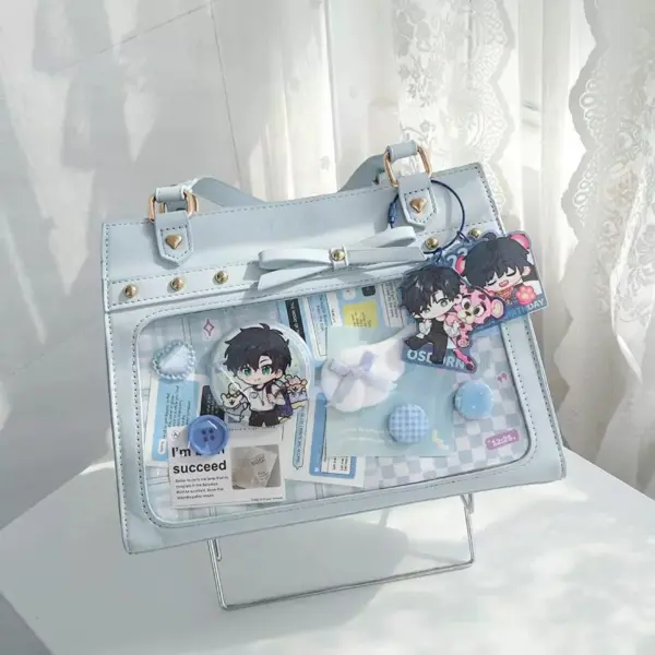 Light blue ita bag centered on white surface with pins
