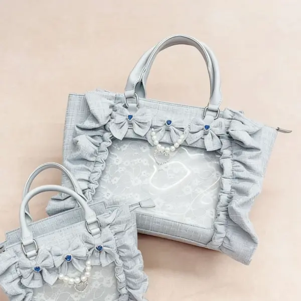Ruffled lace ita bag open showing clear window and internal insert
