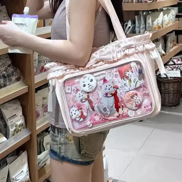 light pink ita bag held by person