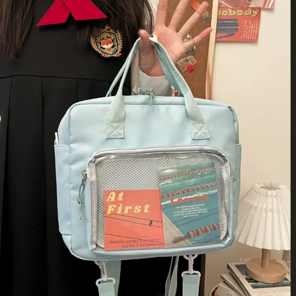Clear window ita bag crossbody at convention Person wearing clear window ita bag crossbody at anime convention