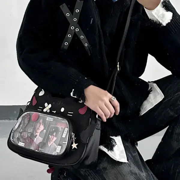 Person wearing cat head ita bag crossbody at convention
