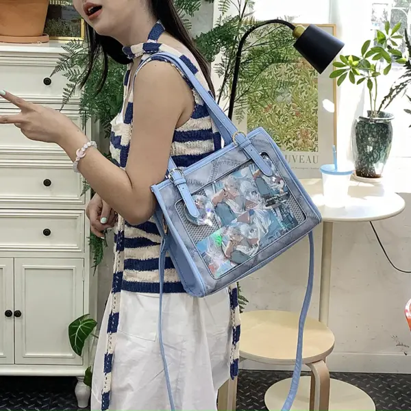 Quilted ita bag open showing clear window and interior