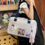 Light Gray Ita Bag with Navy Trim and Pin Display