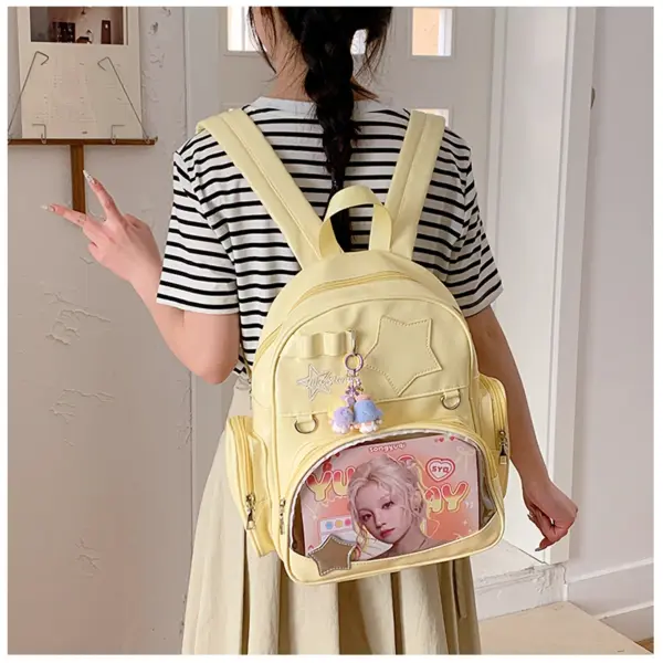 Light green ita backpack on person