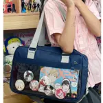 Navy Blue Ita Bag Held by Person