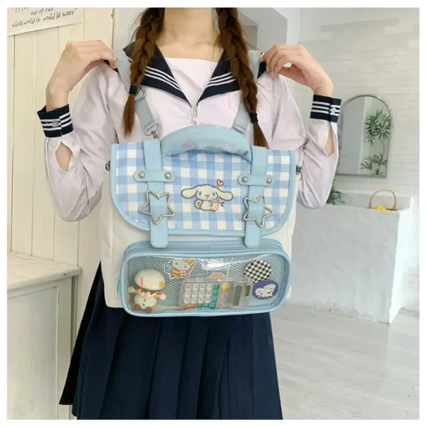 person wearing light blue plaid ita bag at convention