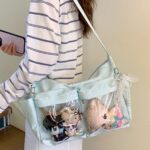 Side Profile of Sky Blue Ita Bag with Reflective Clear Window