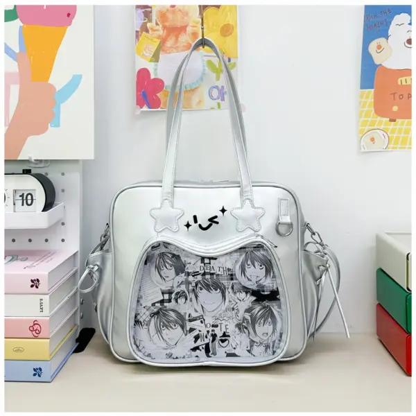Silver metallic ita bag standing on desk with clear window and star patches