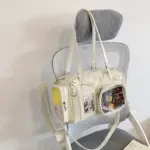 White Ita Bag Hanging on Chair Back White Ita Bag Hanging on Chair Back