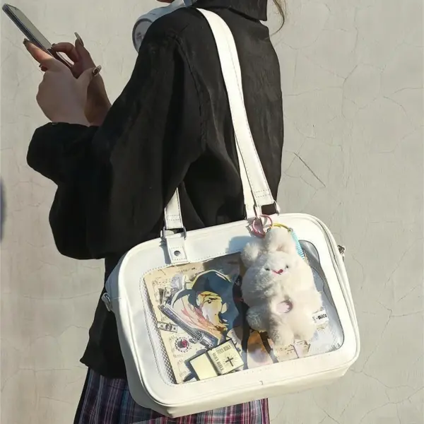 White ita bag crossbody worn at anime convention with pins visible