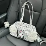 White Ita Bag with Wings in Car