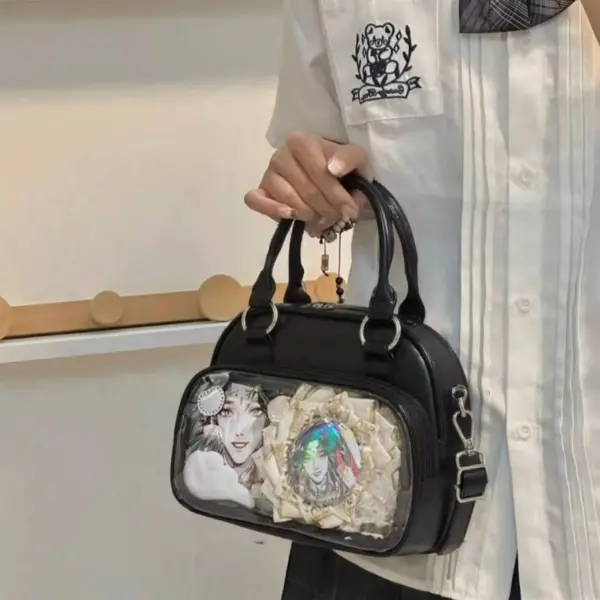 Black ita bag with clear window and floral decorations inside