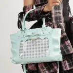Model Holding Mint Green Ita Bag