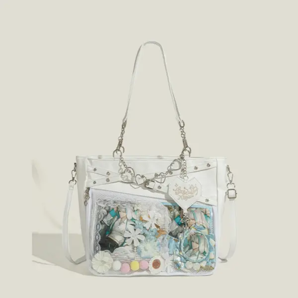 White tote ita bag carried by a person in a casual outfit